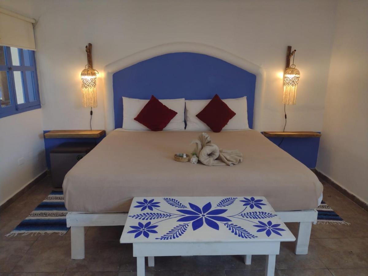Mio Tulum Hotel Boutique 外观 照片 A bedroom in a hotel in Santorini, Greece