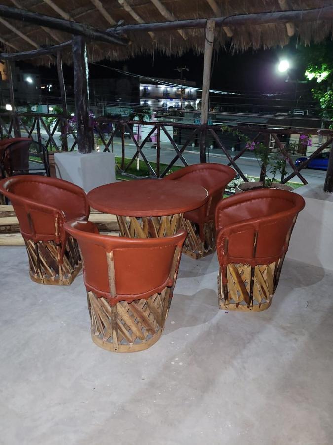 Mio Tulum Hotel Boutique 外观 照片 A set of equipales